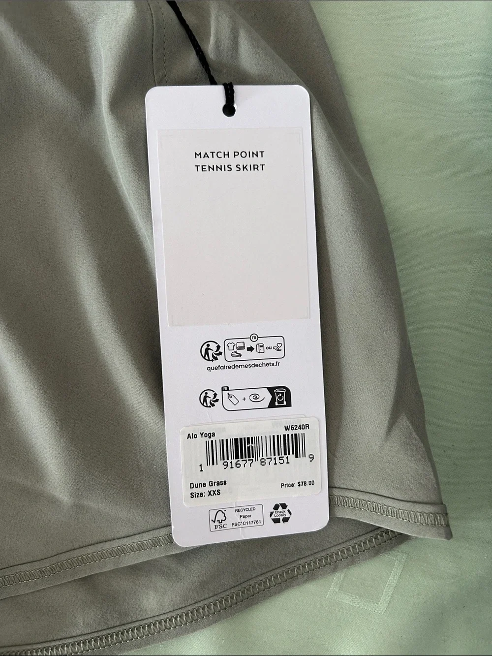 ALO Yoga match point tennis skirt in dune grass color